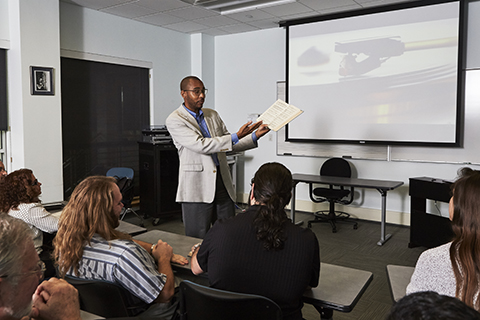 Musicology professor teaching to students